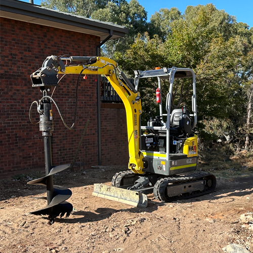 Maxi Equipment Hire - Excavator hire page image of Wacker Neuson 1.8 Ton Excavator with large auger.