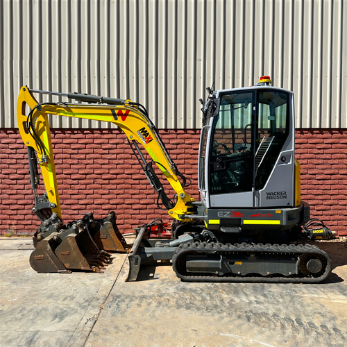 Maxi Equipment Hire - Excavator hire page image of Wacker Neuson 4.5 Ton Excavator with various bucket attachments that are available with hire.