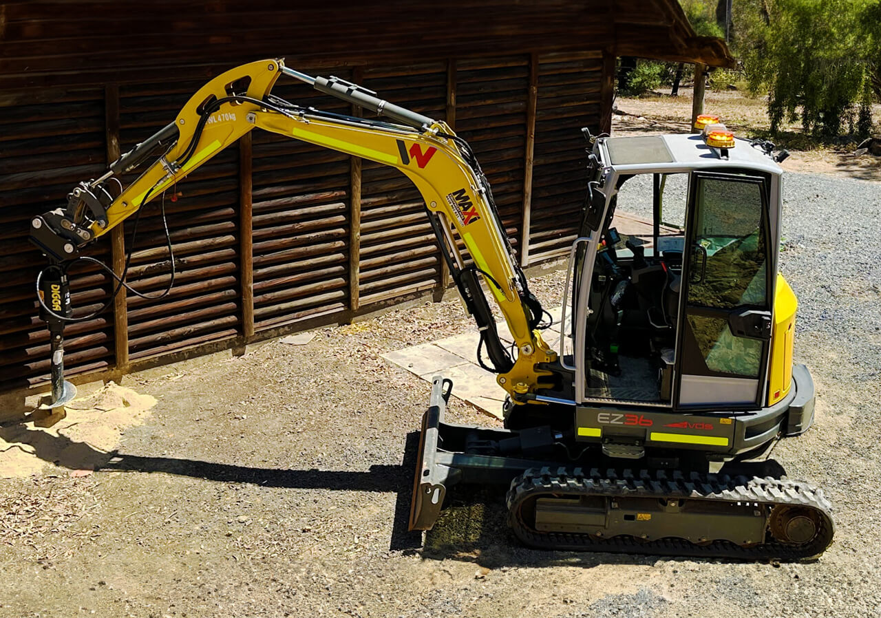 Maxi Equipment Hire photo of Wacker Neuson 4.5 Ton Excavator with auger fitted.