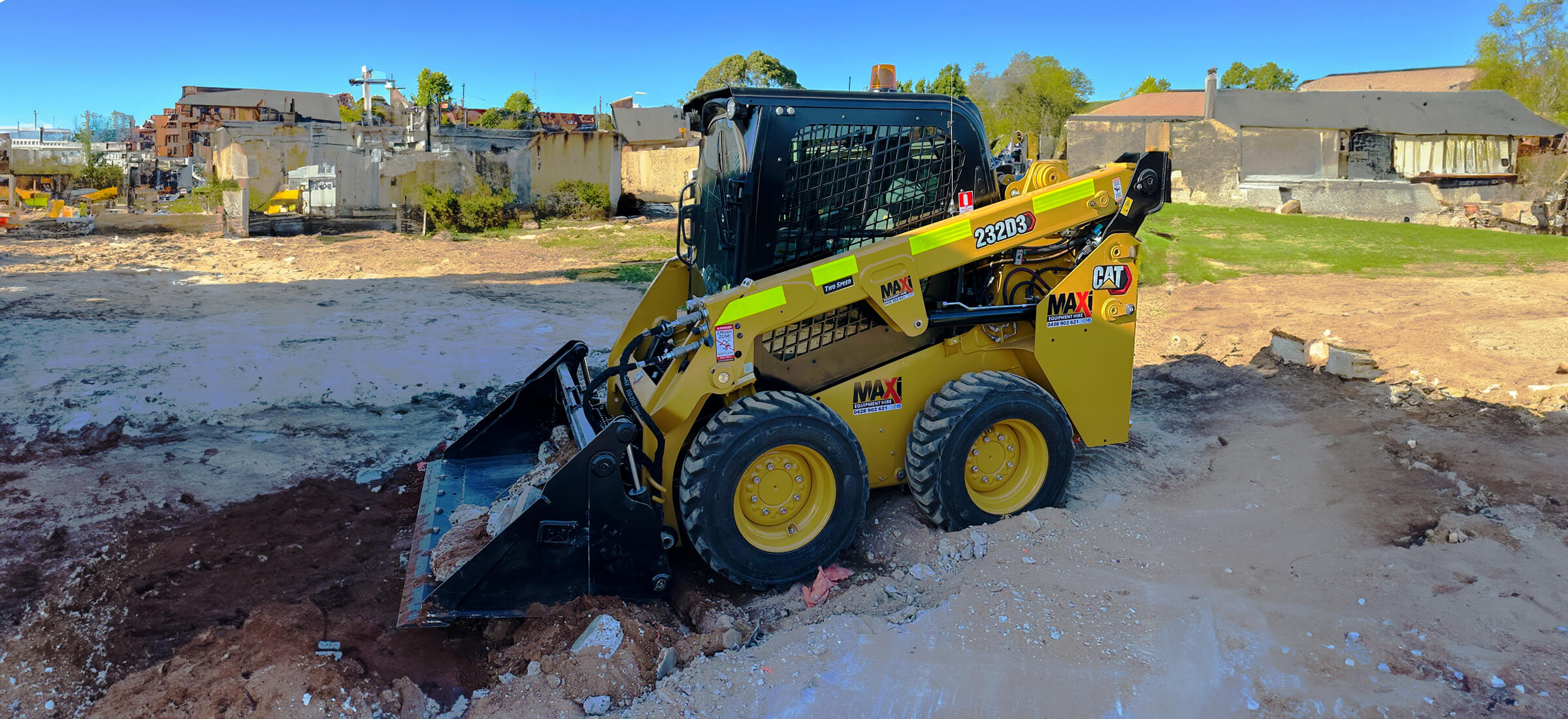 Maxi Equipment Hire photo of Cat 3 Ton Skid Steer conducting earth works.